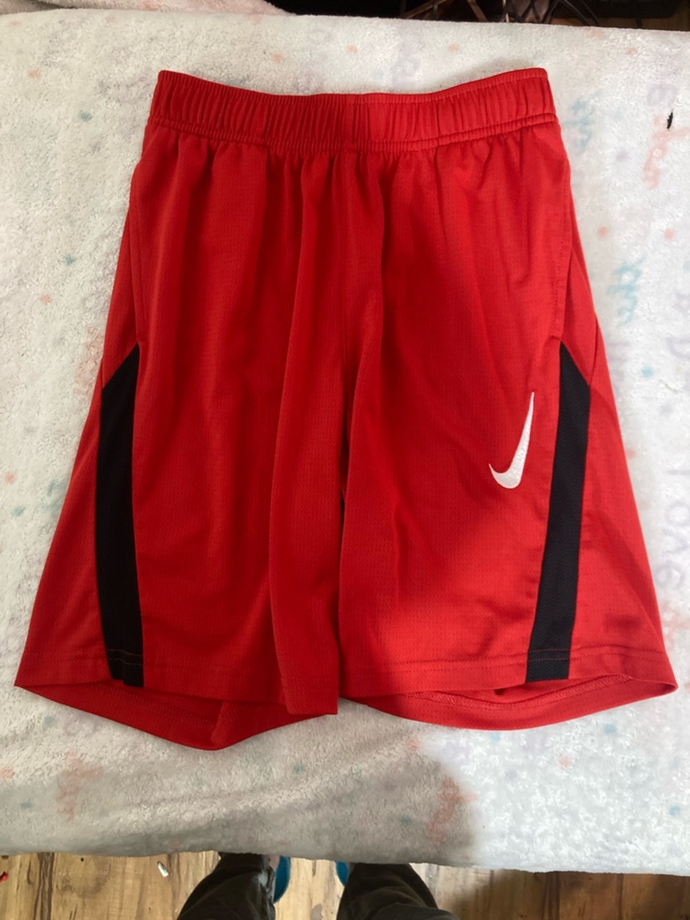 Nike Red Mesh Athletic Shorts with Black Panels and White Swoosh